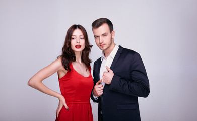 Elegant couple in festive clothes.