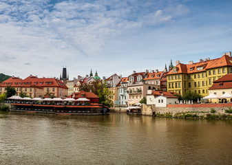 Obraz premium View from Boat to Old Town of East Europe Prague City with stunning sky sunset