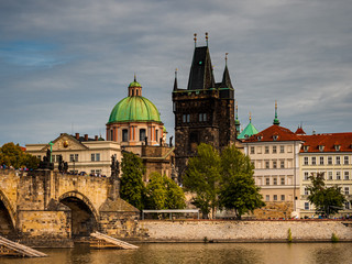 Fototapeta premium View from Boat to Old Town of East Europe Prague City with stunning sky sunset