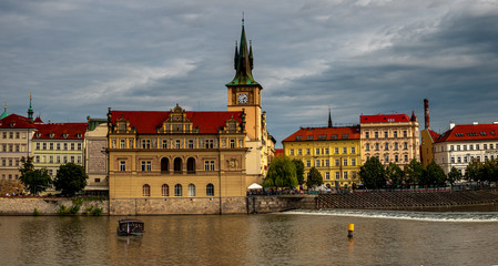 Obraz premium View from Boat to Old Town of East Europe Prague City with stunning sky sunset
