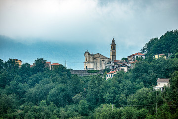 Fototapeta na wymiar church, castle in mountains, italy