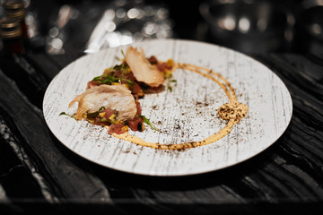 Beautiful and tasty food on a plate, exquisite dish, creative restaurant meal concept, selective focus.