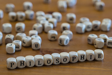Pilosophy written with wooden cubes 