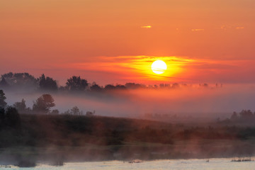 Dawn on a foggy morning. Pskov region