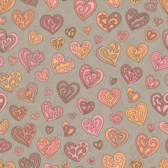 Seamless Pattern of Pastel Beige, Brown, Orange, Pink, Yellow Doodles Hearts.