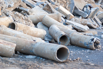 Discarded concrete pipes and rubble