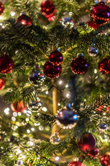 Obraz na płótnie Canvas Christmas decorations in the Christmas tree. blurred background photo