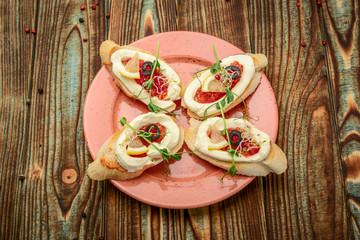 spoon with salmon red caviar, On a wooden background.