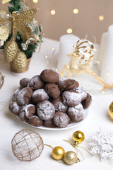 Chocolate Crinkle Cookies in powdered sugar.