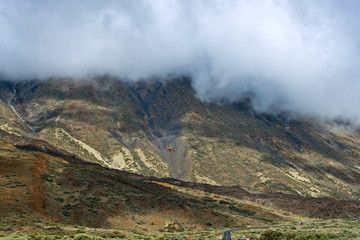 cloud over the mountains near the Teide volcano on the island of Tenerife, track in the clouds, Spain, natural background