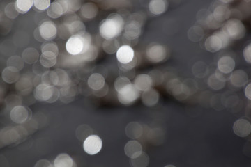 black bakcground over some brights lights in circles