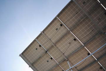 Fototapeta premium Solar panel on a background of blue sky. Alternative Energy Concept