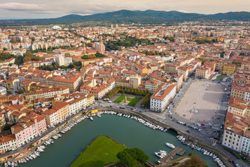 Fototapeta na wymiar aerial view from drone to channels and central square in Livorno in Tuscany in Italy