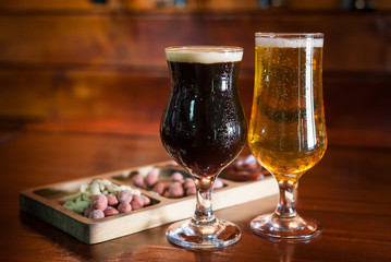 Different varieties of pees are on the bar in the pub.