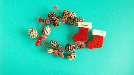 Christmas decorations. New Year decoration. Holiday decorations on a light green background.