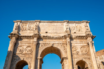 Fototapeta na wymiar Arch of Constantine or Arco di Costantino or Triumphal arch in Rome, near Coliseum.