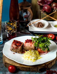 meat roulets with vegetables on the table
