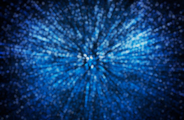 Beautiful shiny background with bokeh and sequins. Abstract sparkling background.