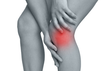 description of pain in the knees marked with a red spot on a white background