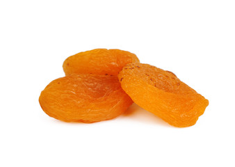 heap of dried apricots isolated on white background