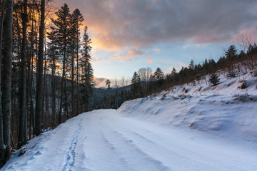 Colorful winter dawn on the mountain valleys in the Ukrainian Carpathian Mountains.	