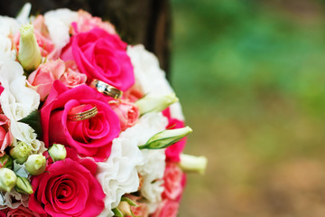 bridal bouquet with wedding rings