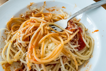 Spaghetti Bolognese with fork in a plate