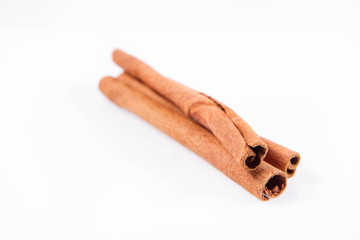 Cinnamon sticks on white background