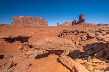 Monument Valley region of the Colorado Plateau with vast sandstone buttes on the Arizona–Utah border, in a Navajo Nation Reservation. USA