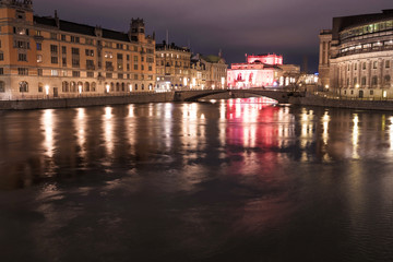 Street with lights on the bridge at night