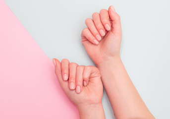 nude manicure gel on a pink background