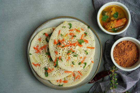 Uthappam/ Oothappam -SouthIndian breakfast set dosa topped with onion carrots