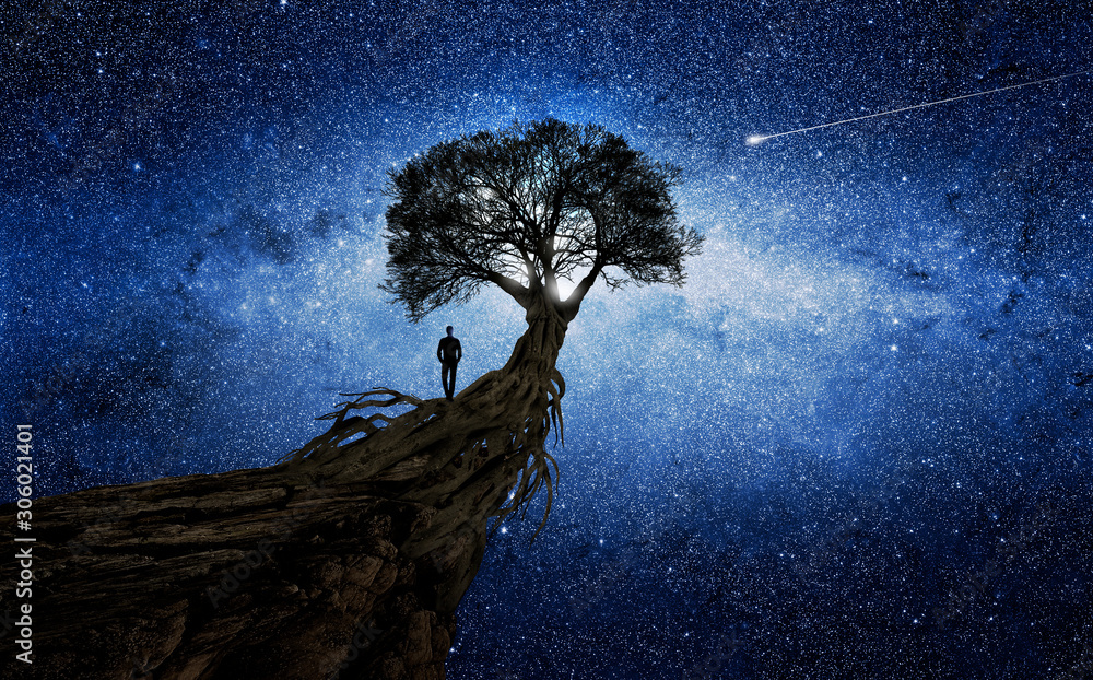 Poster man under a tree in front of the universe