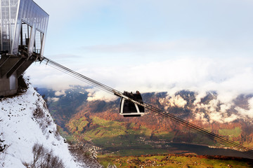 Photo of a cabrio funicular, departing from the Stanserhorn mountain station in Switzerland....