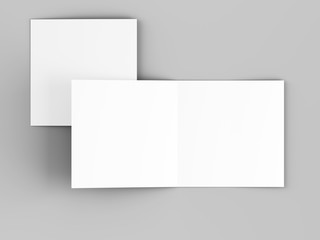Brochure in square format folded to two - mockup. 3d illustration