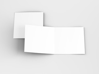 Brochure in square format folded to two - mockup. 3d illustration