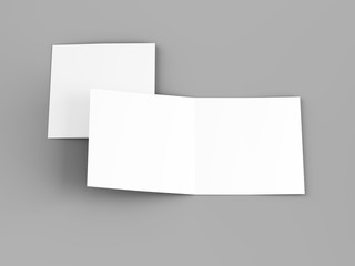 Brochure in square format folded to two - mockup. 3d illustration