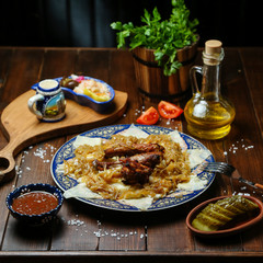 fried chicken with onions on the table
