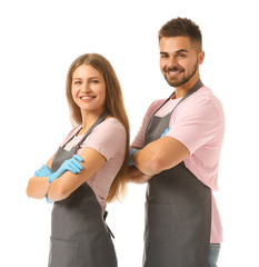 Team of janitors on white background