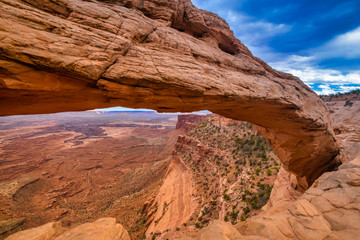 Fototapeta na wymiar Mesa Arch, Canyonlands National Park, Utah, USA. Stunning canyons, mesas, and buttes eroded by the Colorado, Green and tributary rivers
