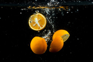 Fototapeta na wymiar fresh lemon in the water