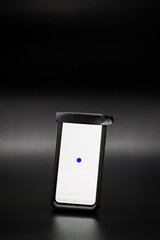 Smartphone with tape covering the phones camera
