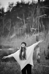 A beautiful ukrainian girl with long hair among the sand in Severodonetsk