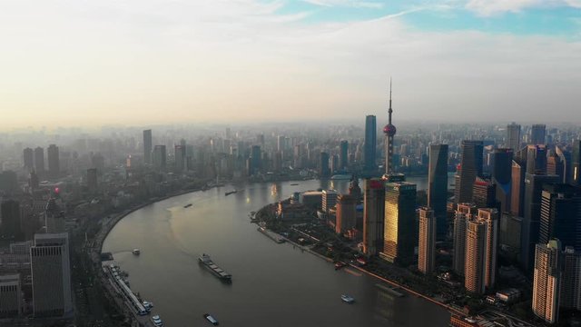 Shanghai Lujiazui business district Aerial with drone scene dolly in movement to central of city in sunrise