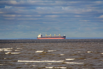 Seascape. Container ship-cargo ship goes to sea