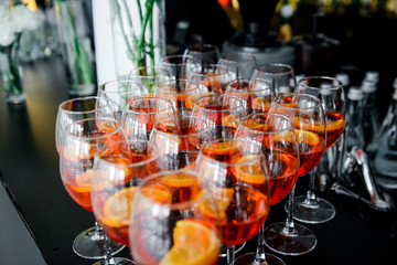 orange aperol in glasses at a banquet