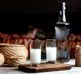 turkish beverage raki on the table - obrazy, fototapety, plakaty