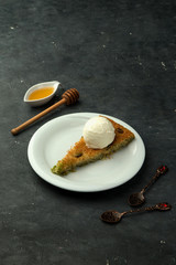 turkish kunefe with ice cream on the table