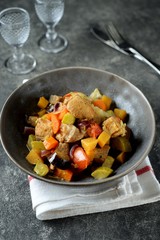 Turkey thigh ragout with organic zucchini vegetables, onions, turnips, tomato and eggplant. Healthy food.