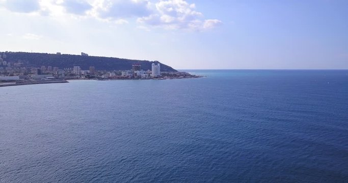 Aerial footage of Haifa Cityscape. Point of view from the sea to Haifa Bay. steady shot.